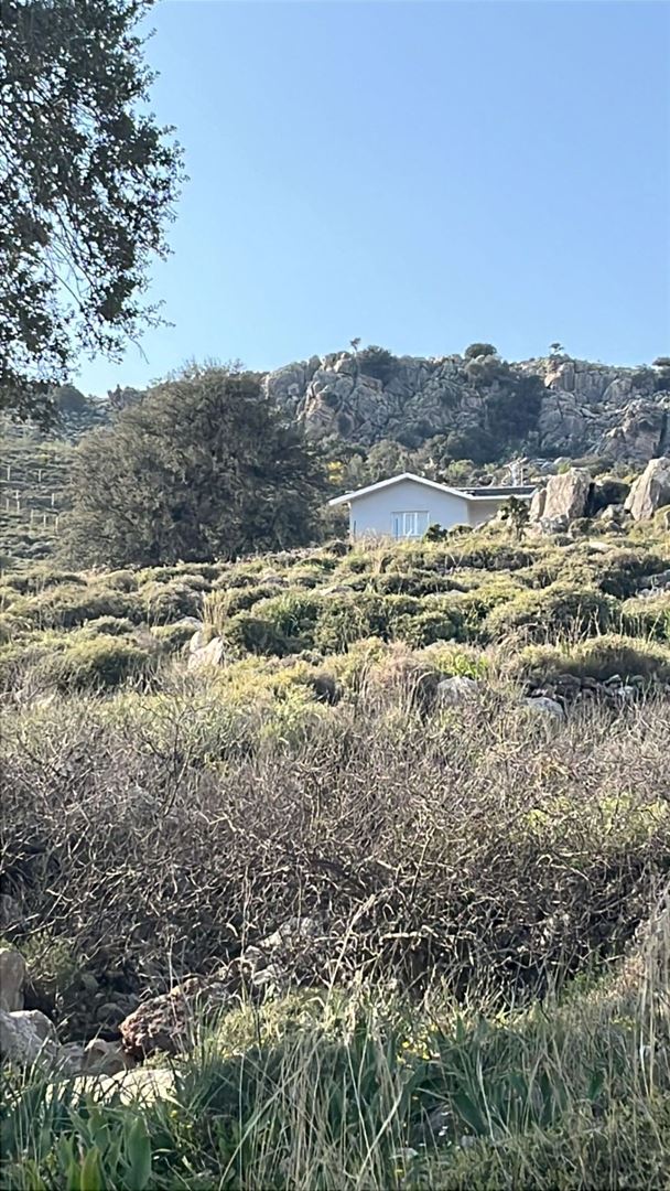 Bozburun Uçören Mevkiinde Satılık 1155 m² Yola Cepheli Tarla